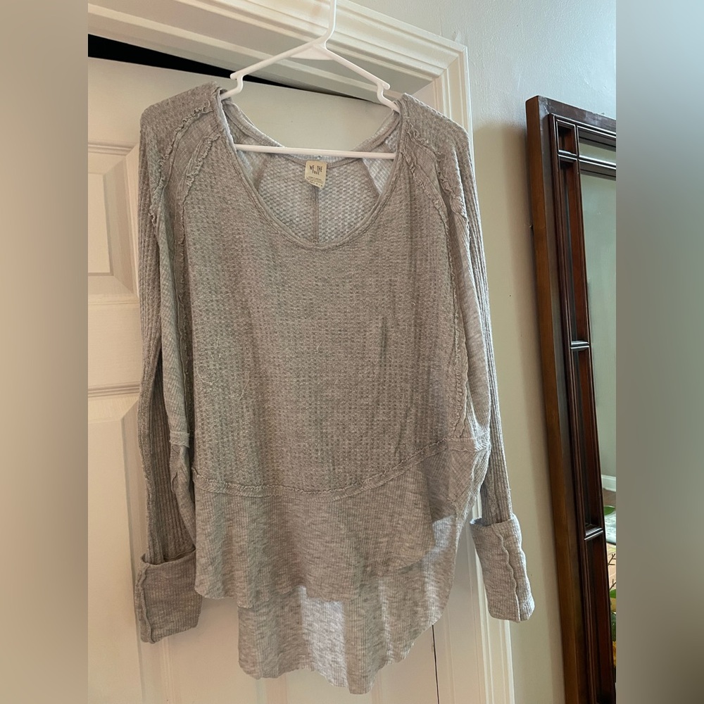 We the free
Light gray top